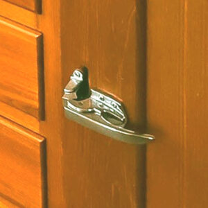 - Latch for overlay doors trigger action with strike box